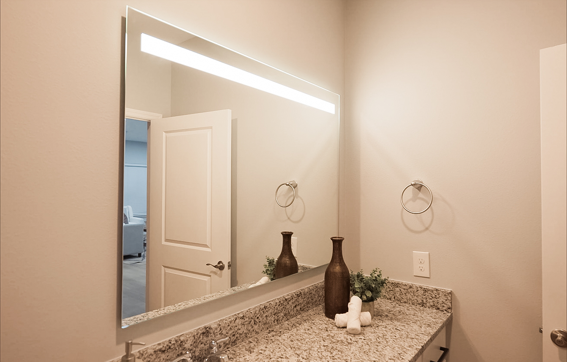 Low-Voltage Backlit Mirrors